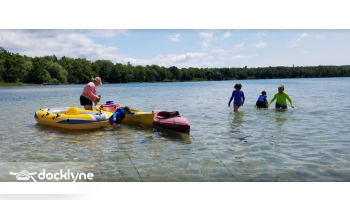 Riverside Canoe Trips boat rental operation on Honor, MI 4