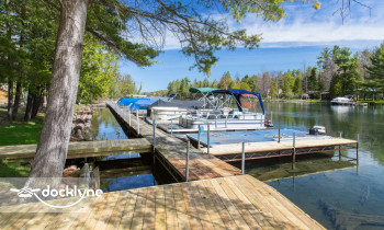 Luhrs Landing Marina boat rental operation on Rapid City, MI 1